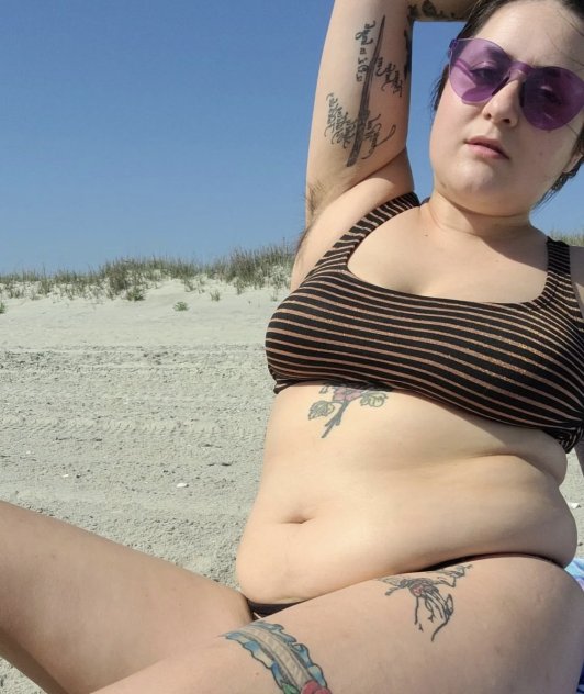 Confident, curvy, and full of charm
