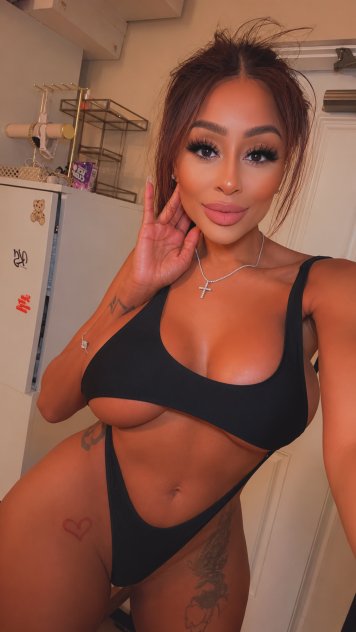 Slim exotic, long legs with dimples
